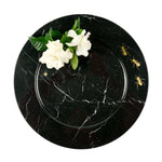 Charger plate in black Marquinia with brass ants inlay