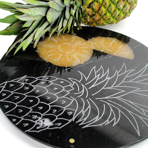 Pineapple - circular centerpiece/serving plate in black Marquina marble