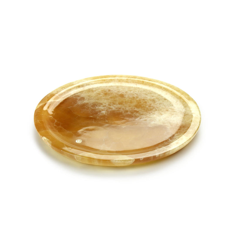 Circular presentation plate in amber onyx